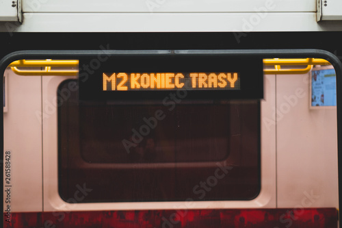 Close-up on part of the train. Display on the subway train with the sign of the end of the route. New subway train for the metro line. Behind the glass are brackets, LCD display, seat backs.