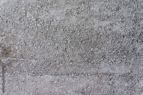 Grungy stone texture of pervious concrete or gravel on construction site
