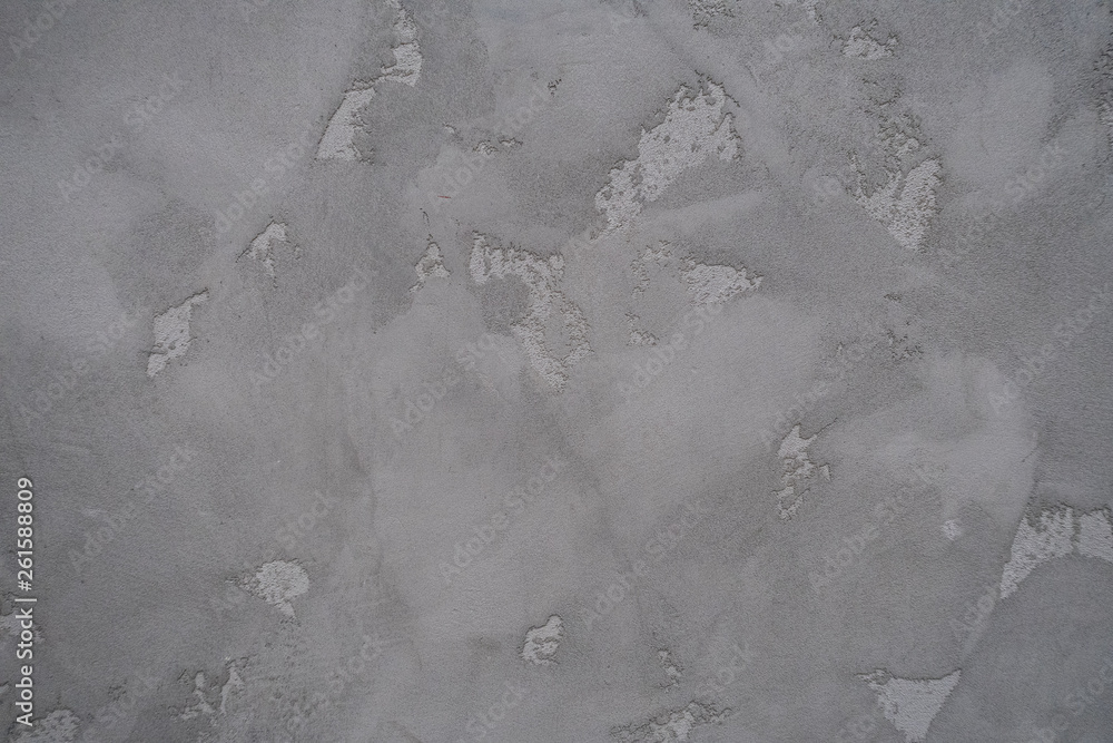Naklejka premium Concrete wall with stains and cracks