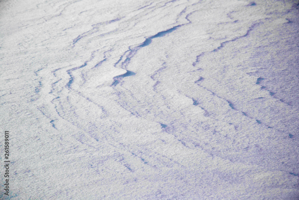 High angle view of snow texture, background with copy space High angle view of snow texture, background with copy space