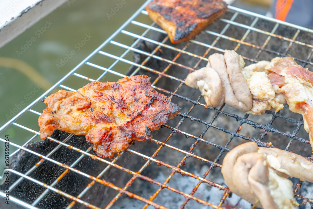 Grilled meat scorched on the grill, burnt Grilled meat scorched on the grill, burnt