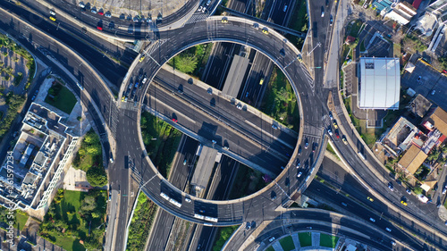 Aerial drone photo of multilevel highway junction urban ring crossing road during rush hour