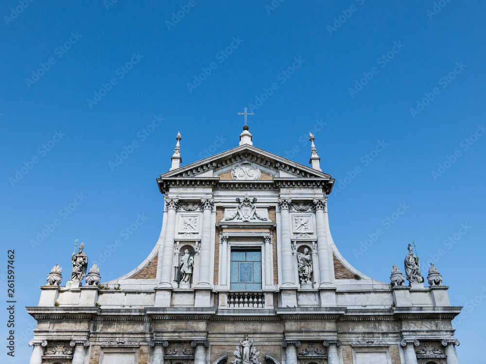 Detail of The basilica of Santa Maria in Porto  with a rich facade from the 18th century in Ravenna