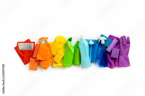 Cleaning products and tools set of rainbow colors isolated on white background. Spring cleaning concept. Place for text. Top view