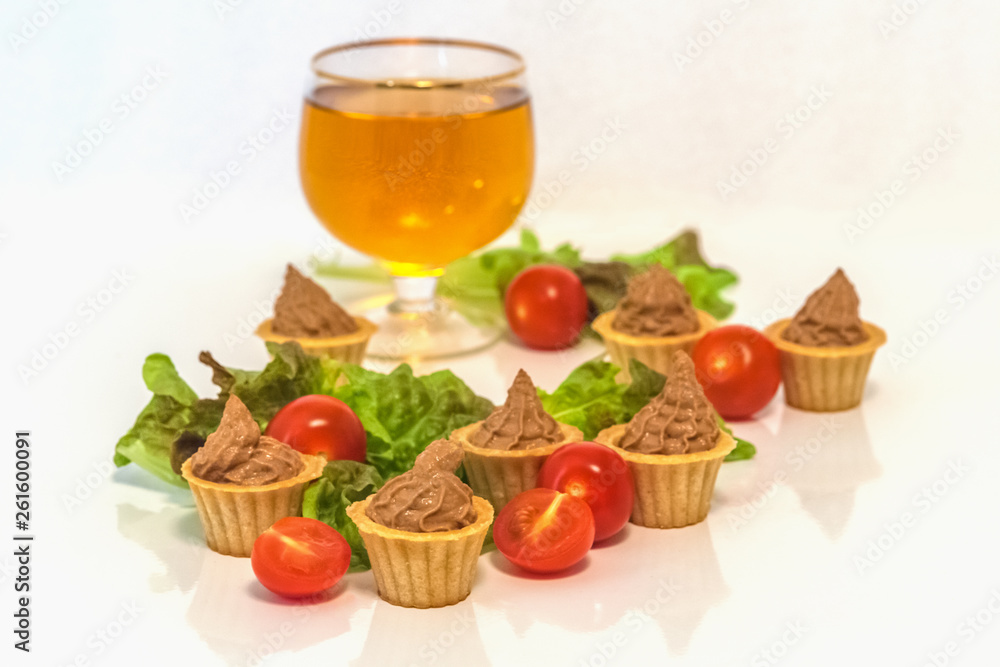 tartlets with liver pate decorated with lettuce and cherry tomatoes tartlets with liver pate decorated with lettuce and cherry tomatoes