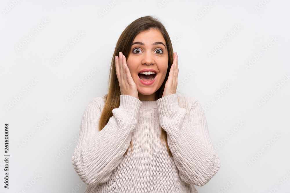 Young girl with white sweater with surprise facial expression Young girl with white sweater with surprise facial expression