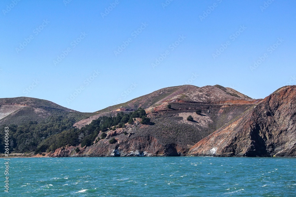 Gorgeous blue water of Pacific ocean and mountains of San Francisco. Beautiful nature landscape backgrounds.
