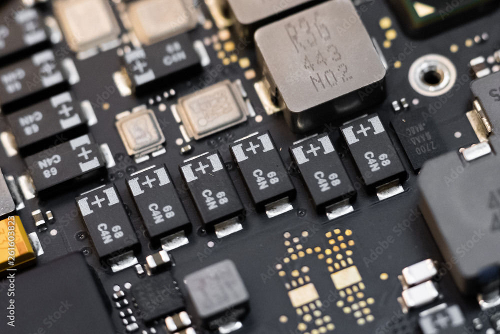 Close -up macro shot of circuit board from a laptop or smartphone Close -up macro shot of circuit board from a laptop or smartphone