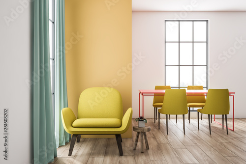 White and yellow dining room interior, armchair