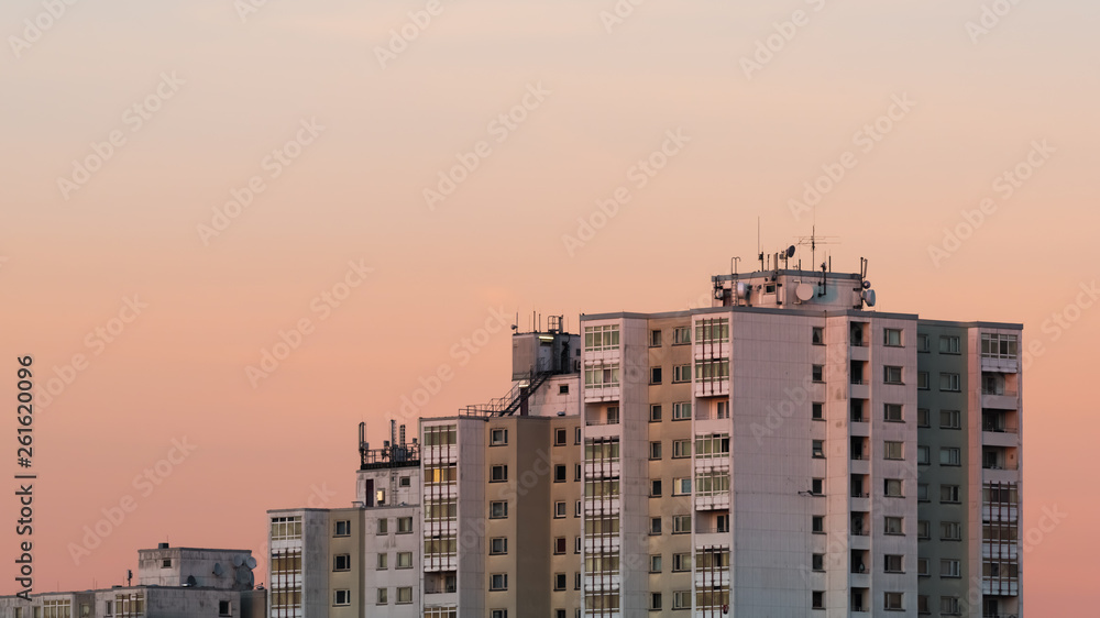 An apartment house at a sunset with a clear sky. Berlin, February, 15-2019.