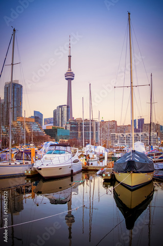 Canvas Print Blue hour at Toronto harbor with CN tower and high rise buildings as background