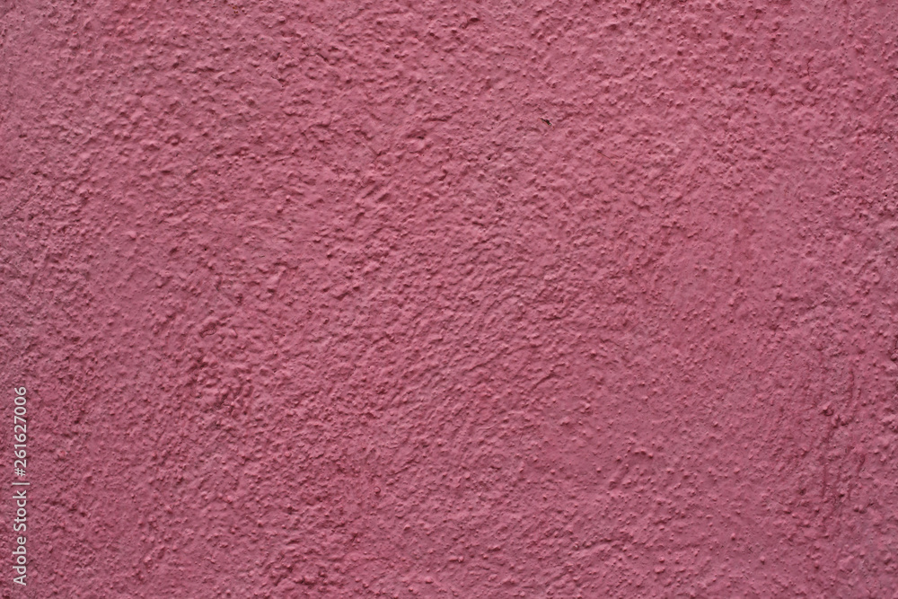 Dirty pink painted stucco wall. Background texture. Dirty pink painted stucco wall. Background texture.