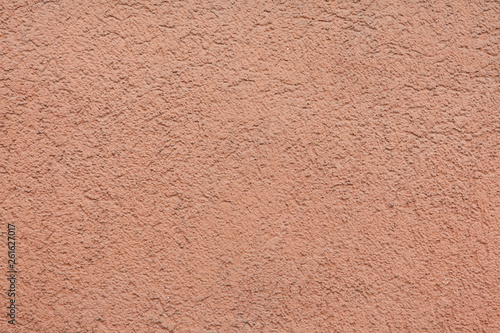 Pink painted stucco wall. Background texture