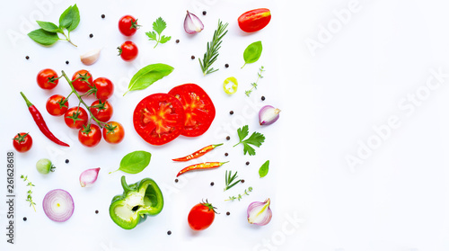 Various fresh vegetables and herbs on white. Healthy eating concept