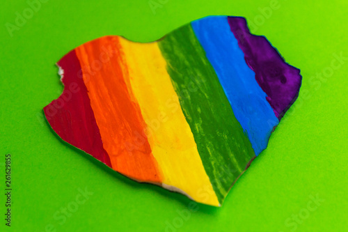 Concept - harassment of the freedom of the LGBT community  a burned and torn rainbow heart  short focus