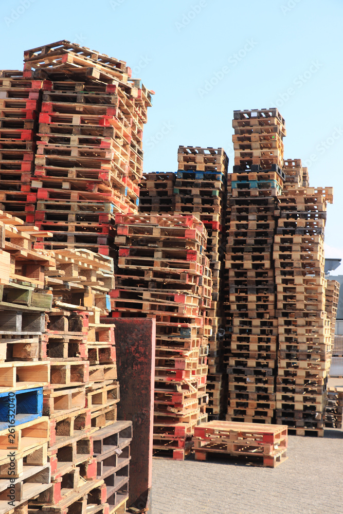 Stacked wooden pallets Stacked wooden pallets