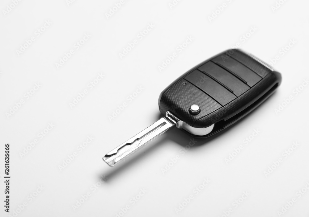 New modern car key on white background New modern car key on white background