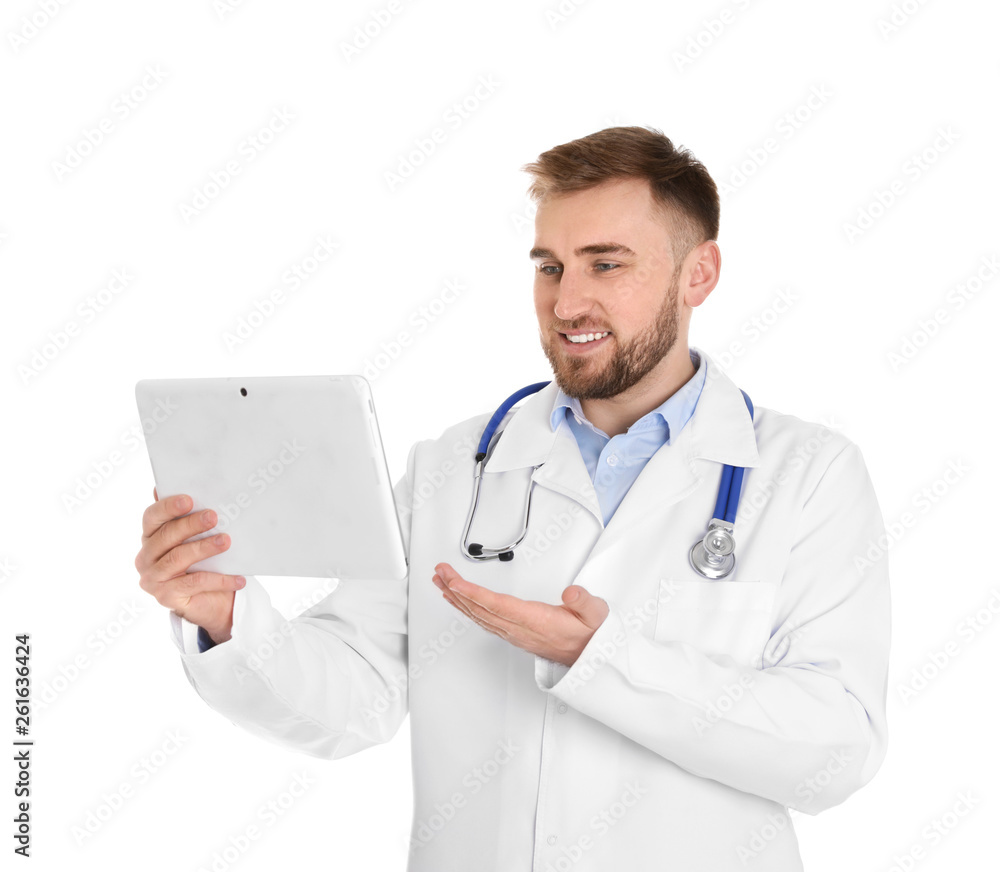Male doctor using video chat on tablet against white background Male doctor using video chat on tablet against white background