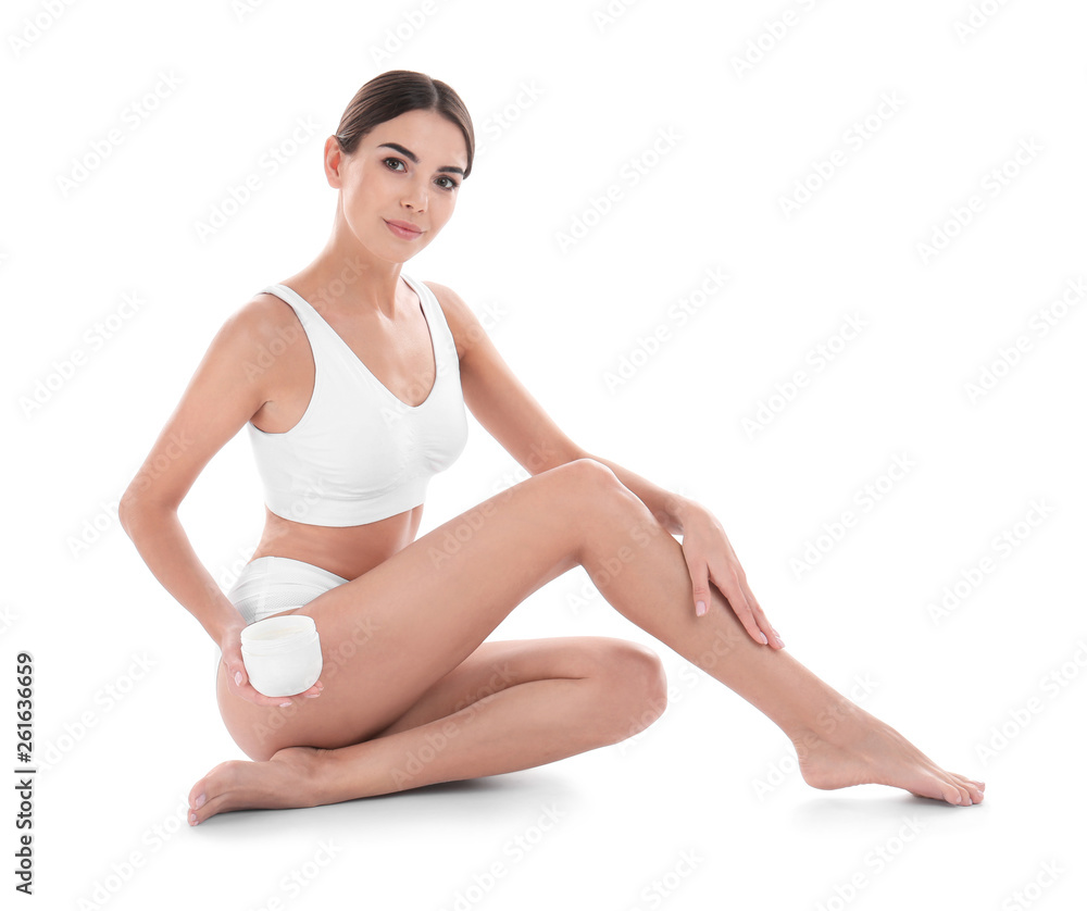 Young woman with jar of cream on white background. Beauty and body care