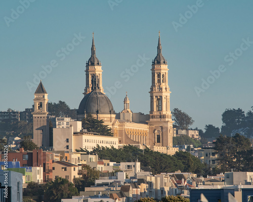 Saint Ignatius Church in San Francisco, viewed from the north west. Evening sun from the west, clear blue sky.