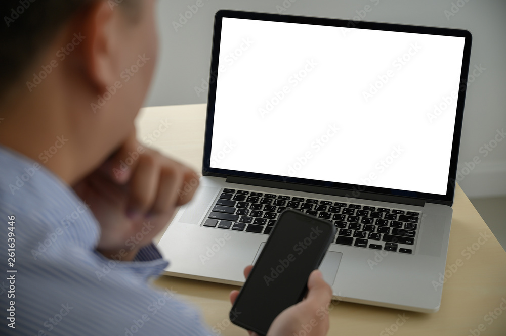 man working on his laptop with blank copy space Laptop with blank screen Mock up Blank screen computer man working on his laptop with blank copy space Laptop with blank screen Mock up Blank screen computer