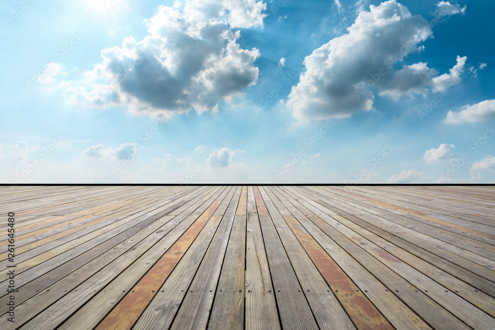 Empty wooden platform and beautiful sky clouds landscape