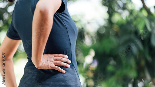 Young Asian women with back pain  , health care concept