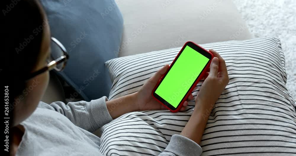 Housewife use of mobile phone with chroma key Housewife use of mobile phone with chroma key