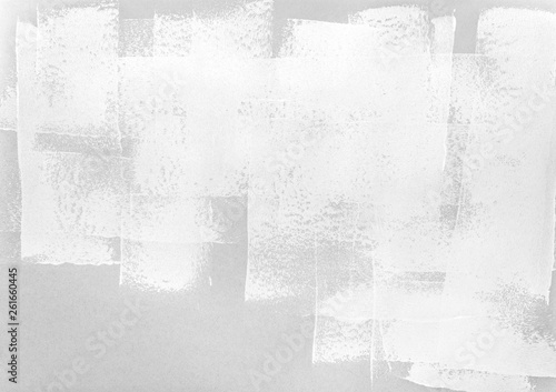 paint roller strokes on grey paper background. monochrome texture.