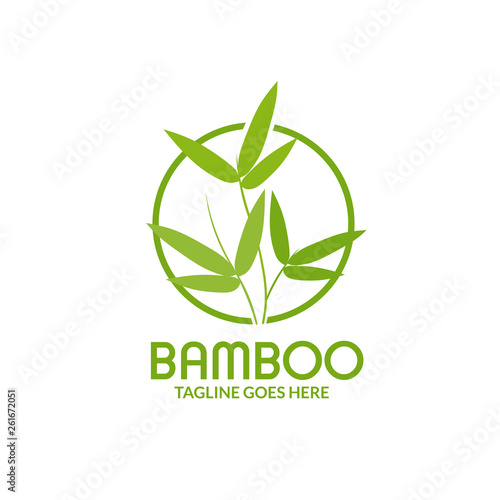 Bamboo leaves with circle logo isolated over a white background
