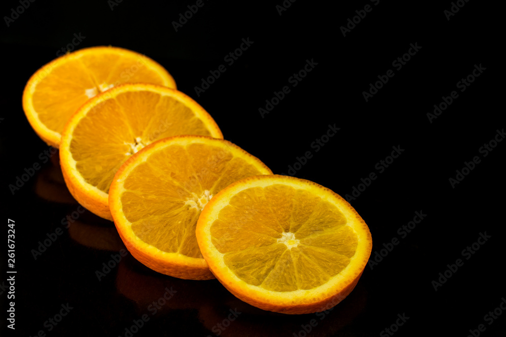 Orange sliced ​​on black background