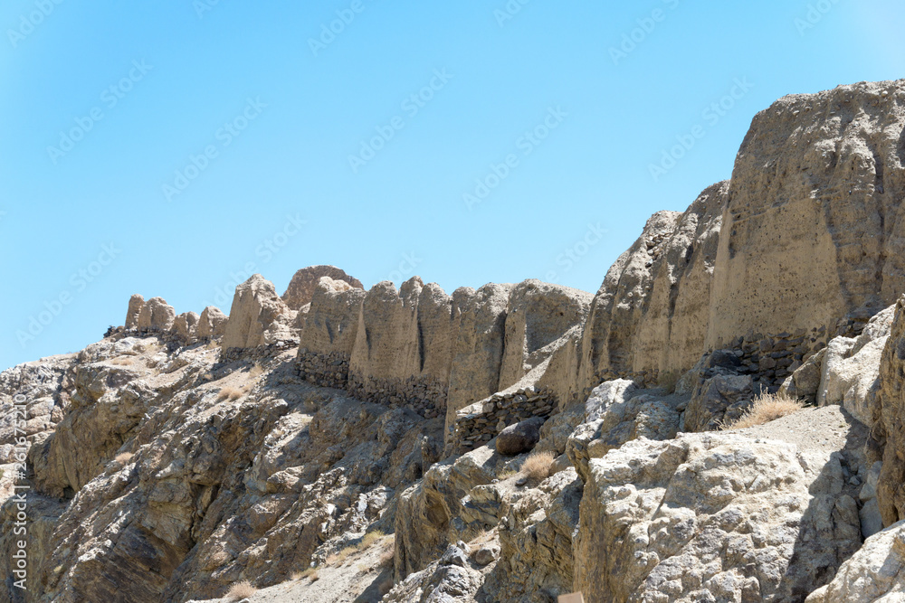 Pamir Mountains, Tajikistan - Aug 23 2018: Ruins of Khaakha Fortress in the Wakhan Valley in Gorno-Badakhshan, Tajikistan. It is located in the Tajikistan and Afghanistan border.