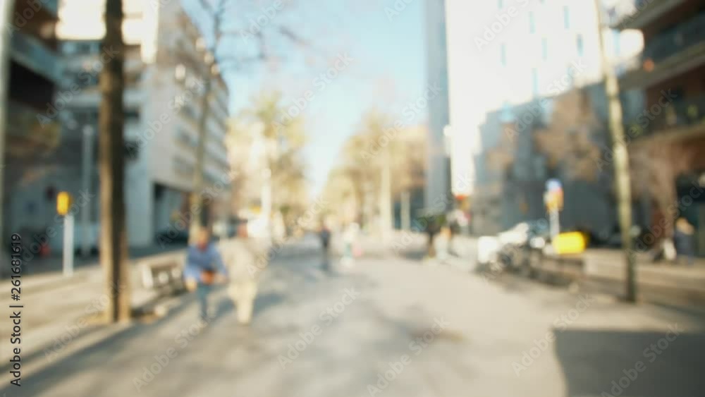 First-person POV handheld shot, slow motion: walking on a public street at day, everything is blurry and defocused. First-person POV handheld shot, slow motion: walking on a public street at day, everything is blurry and defocused.