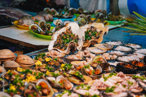 Street food at night in Phu Quoc island in Vietnam | Delicious seafood for tourist at market