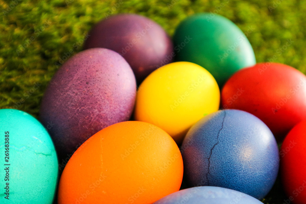 several colorful easter eggs on the green grass background closeup several colorful easter eggs on the green grass background closeup