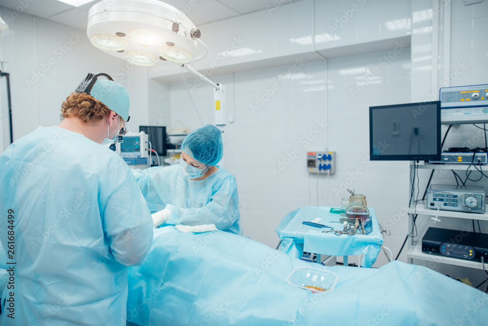 surgeon in surgery room surgeon in surgery room