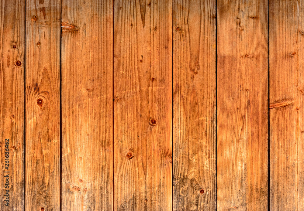 The look of a wooden wall from the boards, a beautiful texture, a village.