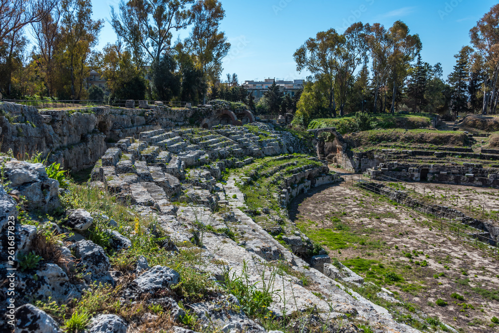 Ruins of the Greek Amphitheater at the Ancient Archeological Park in Syracuse, Sicily, Italy