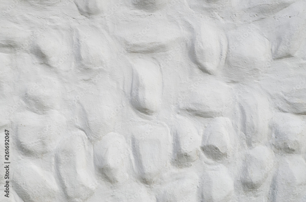 Obraz premium New decorative white relief plaster with rounded convex elements