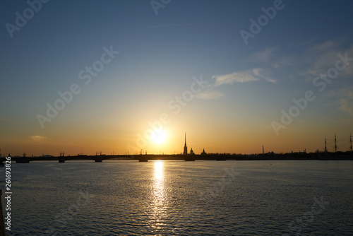 sunset over the river, Saint Petersburg view of the city of Peter and Paul Tower and the new tower lahta center. © Alex