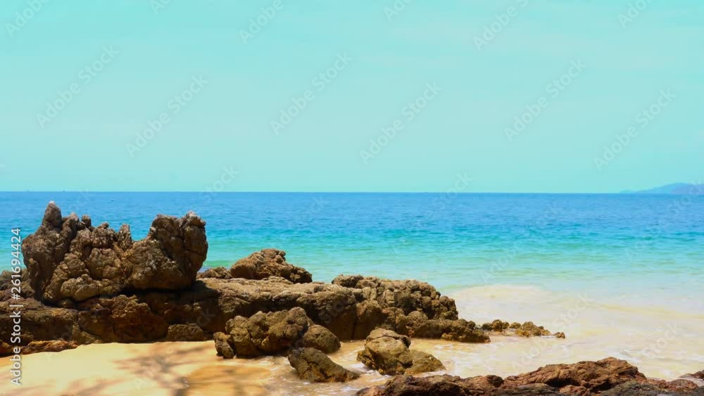 blue wave hit on the rock in Kwangpeeb beach Phayam island Ranong Thailand. blue wave hit on the rock in Kwangpeeb beach Phayam island Ranong Thailand.