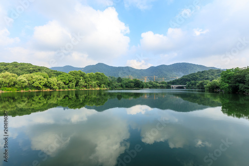 Green mountain and calm lake natural scenery in Hangzhou