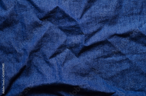 Wrinkled denim fabric texture
