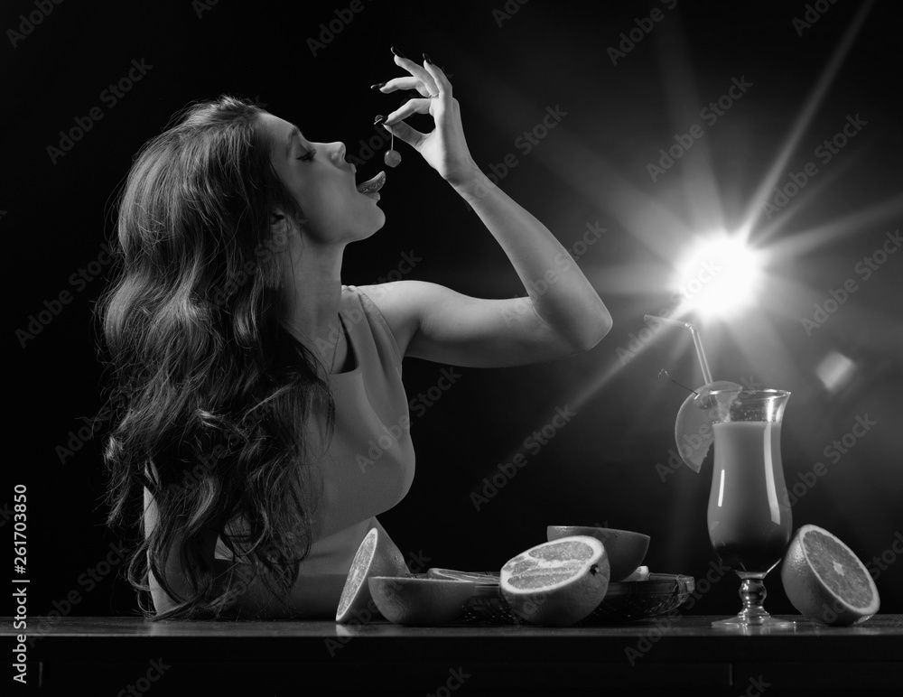 Young beautiful girl with glass of cocktail Tequila Sunrise. Young beautiful girl with glass of cocktail Tequila Sunrise.