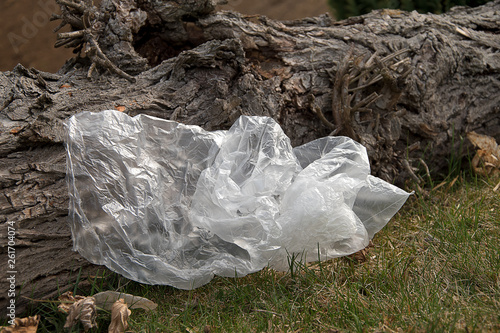 Pollution of plastics on the planet. Plastic bags flying over the ground. Environmental Protection. Plastic bottles and other garbage problem world.