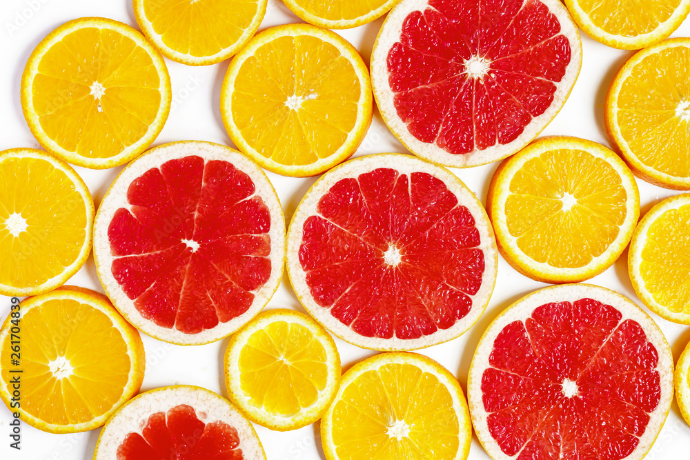 citrus slice, oranges and grapefruits on white background. Fruits backdrop citrus slice, oranges and grapefruits on white background. Fruits backdrop