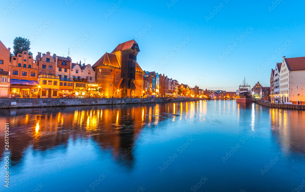 Gdansk old town at night with reflection in Motlawa river, Poland 