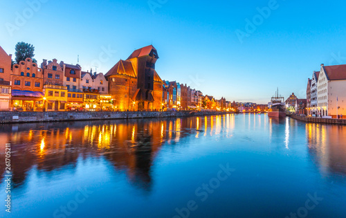 Gdansk old town at night with reflection in Motlawa river, Poland 