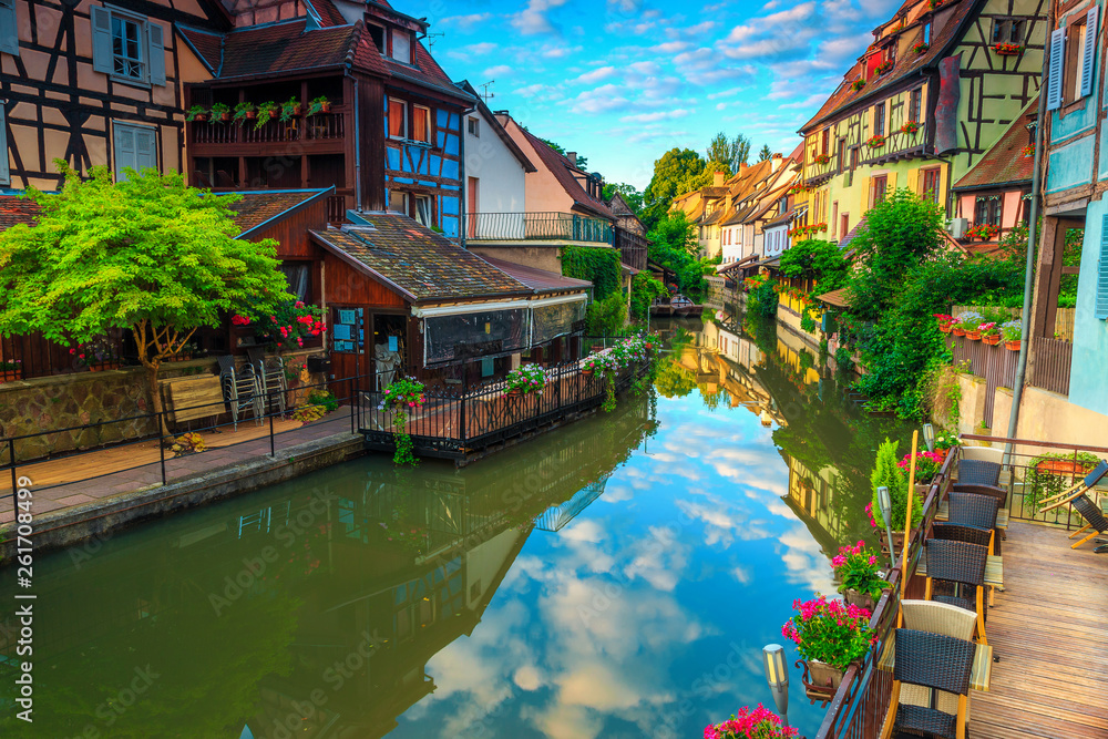 Obraz premium Stunning medieval colorful facades reflecting in water, Colmar, France, Europe