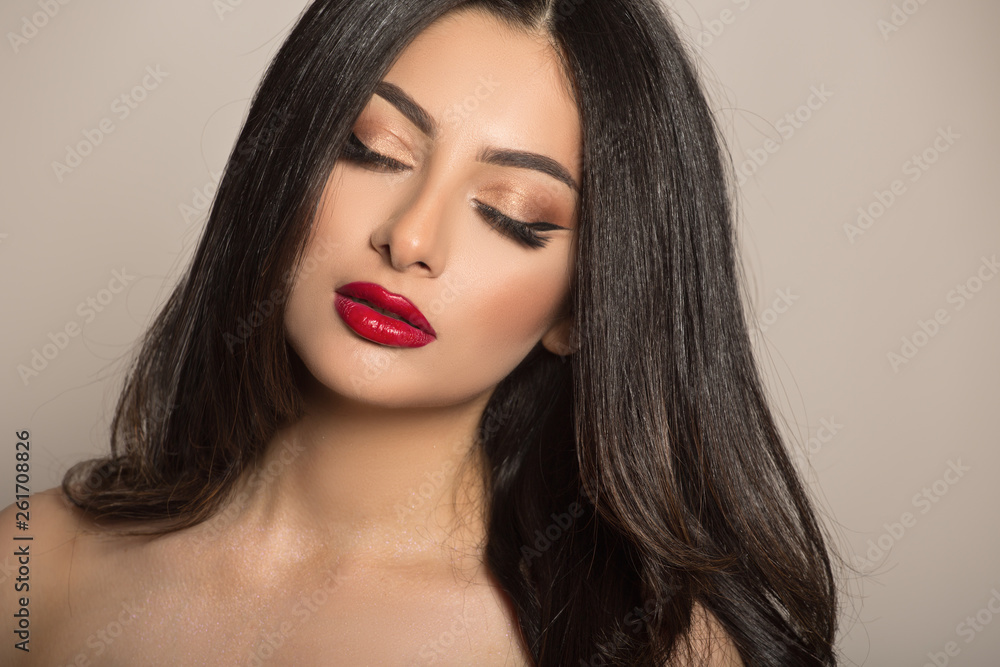 Makeup dark-haired woman. Red lipstick. Fashion and beauty Stock Photo |  Adobe Stock